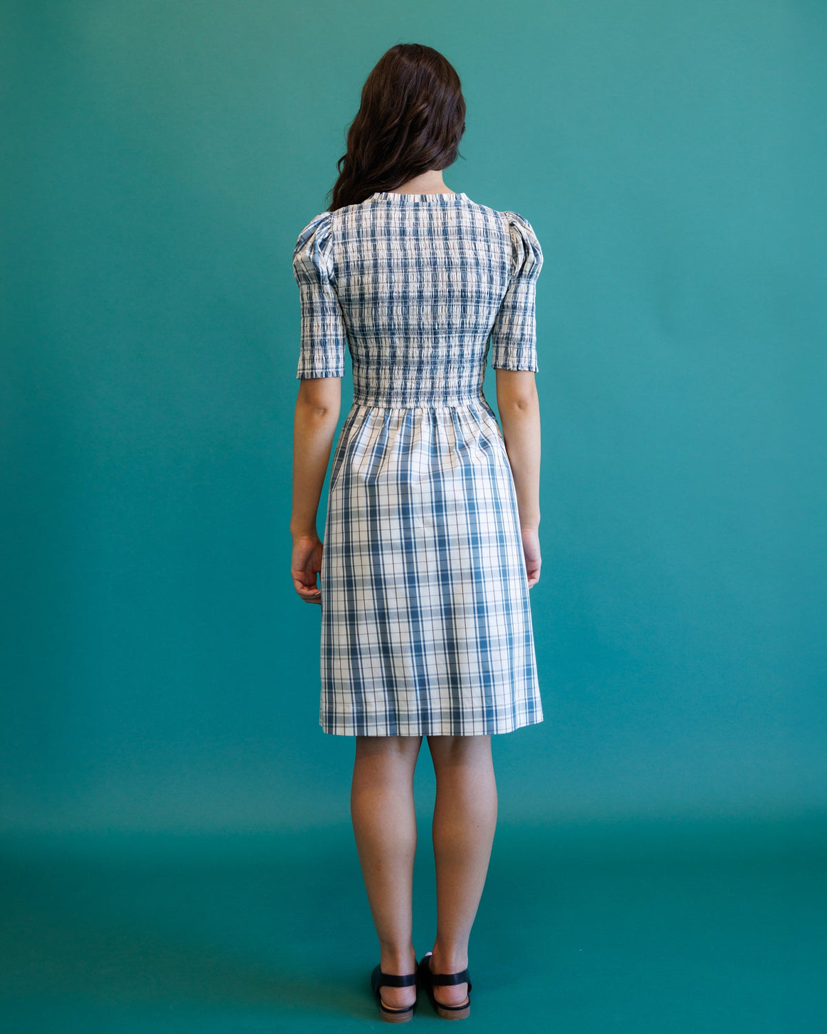 Cream and blue plaid dress with gathered back yoke and above-knee length