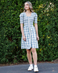 Cream and blue plaid dress with square neckline, button front, short puff sleeves