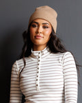 Alpine beanie in tan rib-knit with folded brim