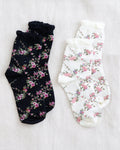Floral sock set with dark and white pairs, pink flower prints, crew length