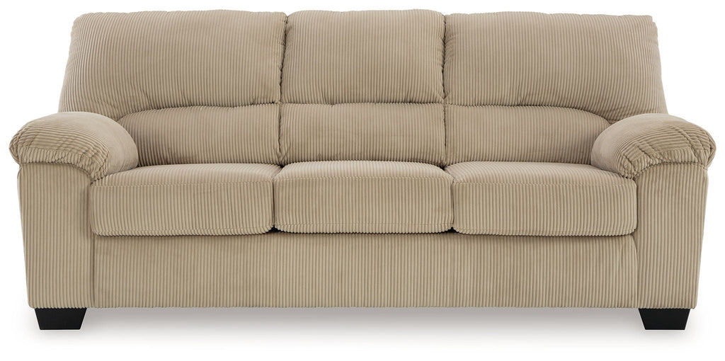 Beige three-seat sofa with ribbed upholstery and three back sections