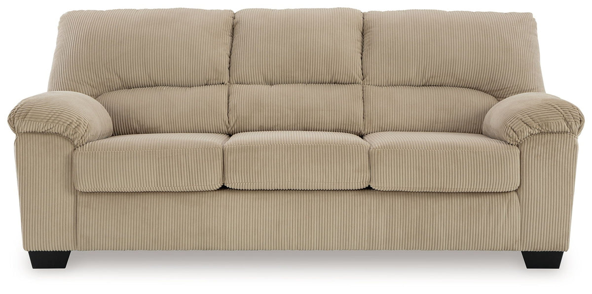 Beige three-seat sofa with ribbed upholstery and three back sections