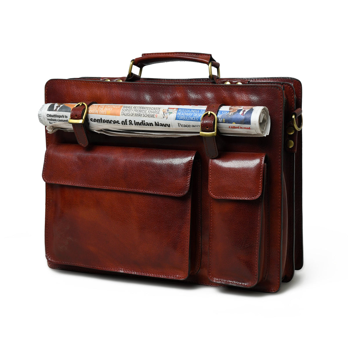 Tan leather briefcase with front pocket and bottle stored inside top compartment.