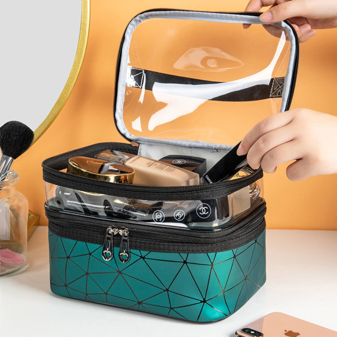 Clear top double cosmetic bag opened, black zipper and teal geometric pattern