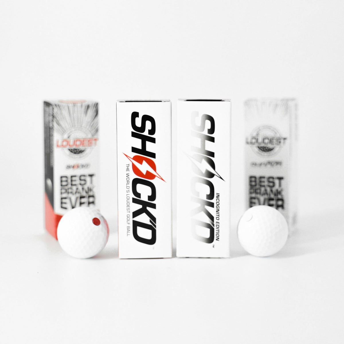 Golf ball multipack with Shock'd branded boxes and two white balls with red dots