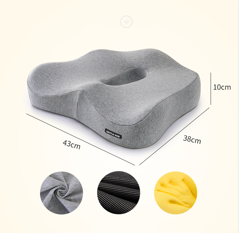Light gray contoured seat cushion with oval cutout and thick memory foam shape