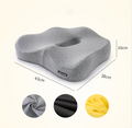 Light gray contoured seat cushion with oval cutout and thick memory foam shape