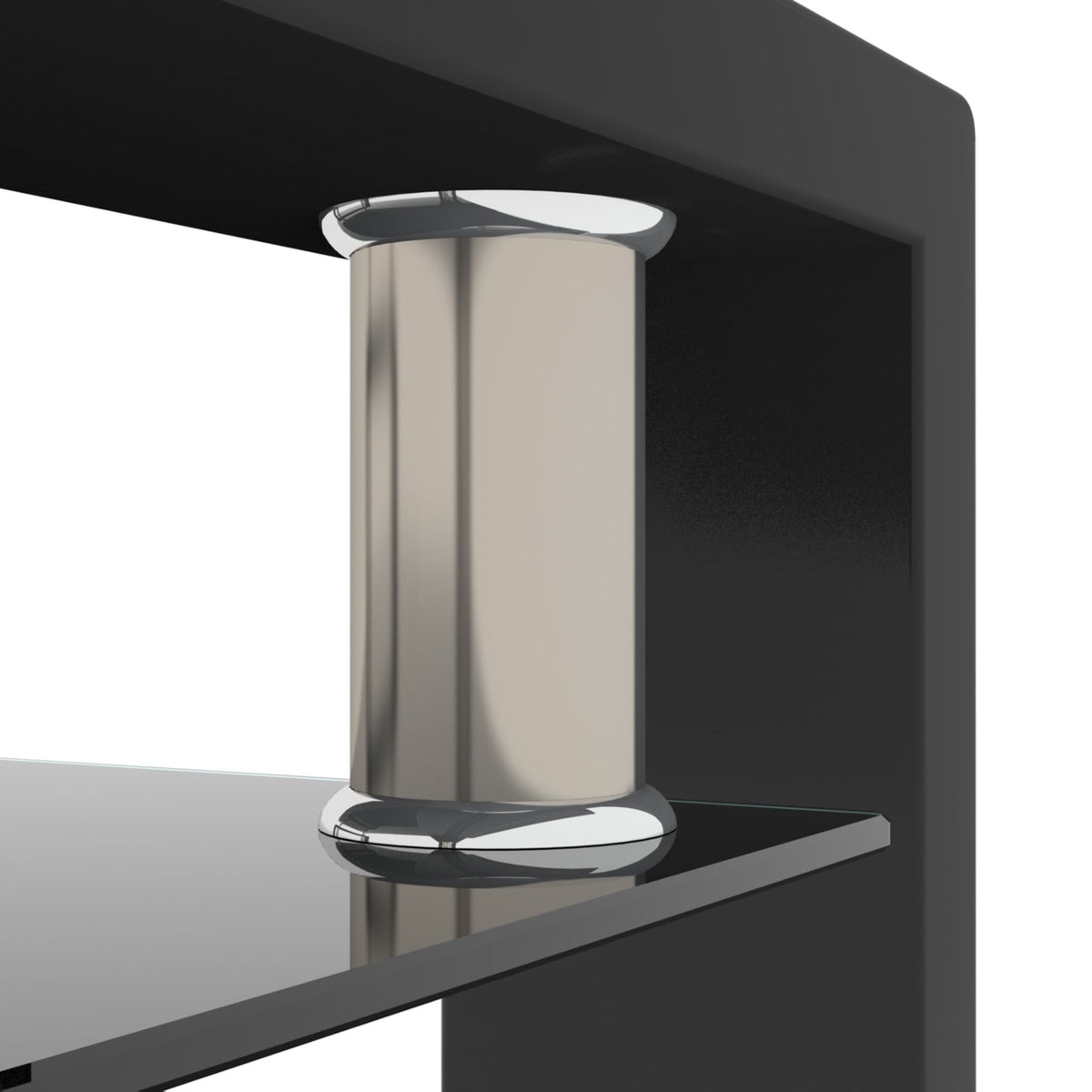 Close-up of chrome-capped leg and black frame on glass coffee table