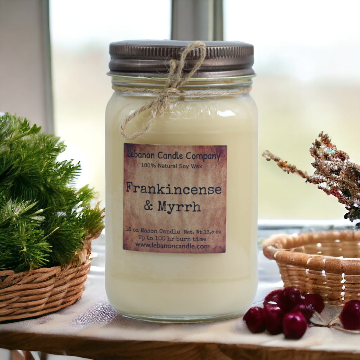 Frankincense & Myrrh soy candle in clear jar with twine tie and label on tray
