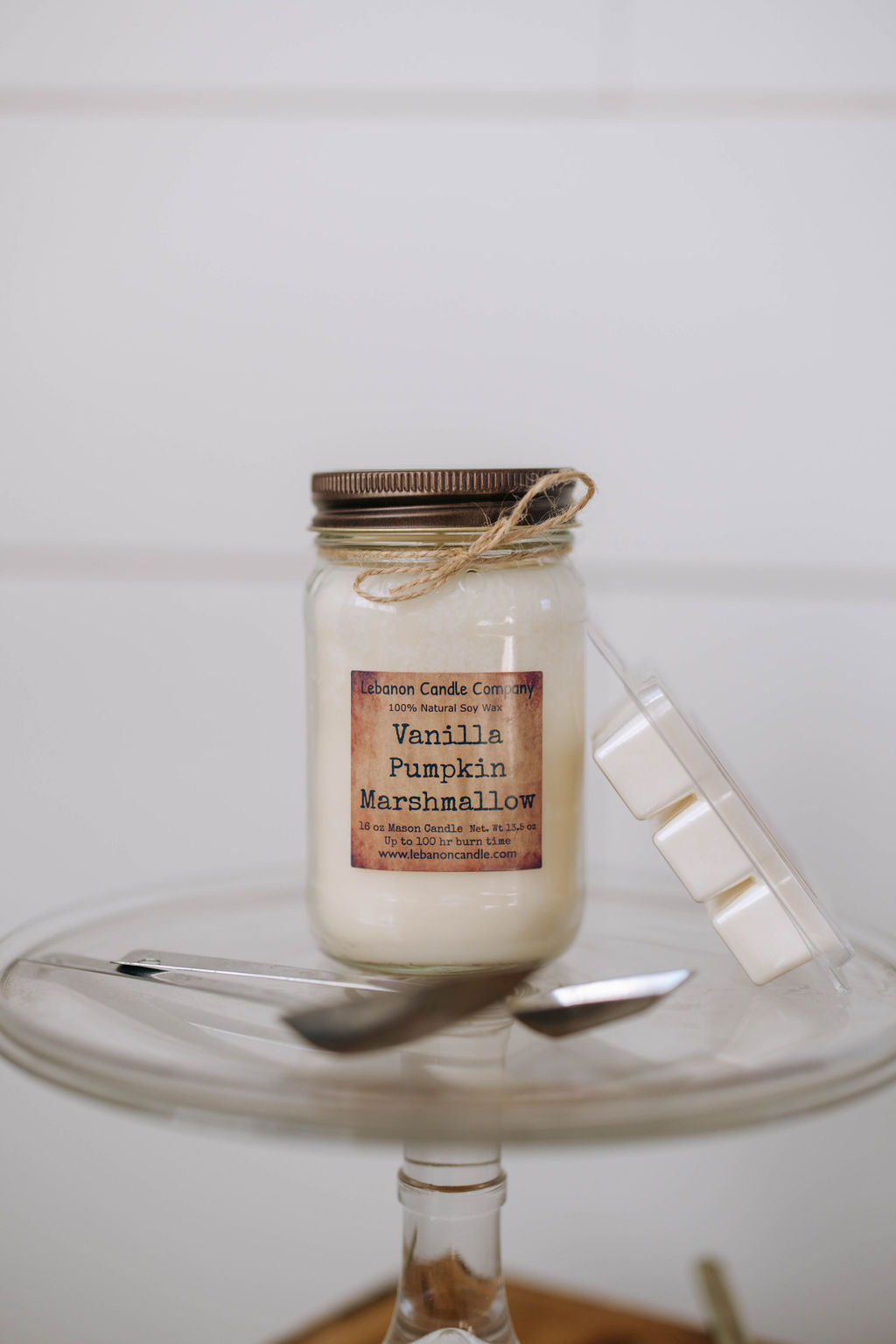 Jar candle with vanilla pumpkin marshmallow label and twine-tied bronze lid