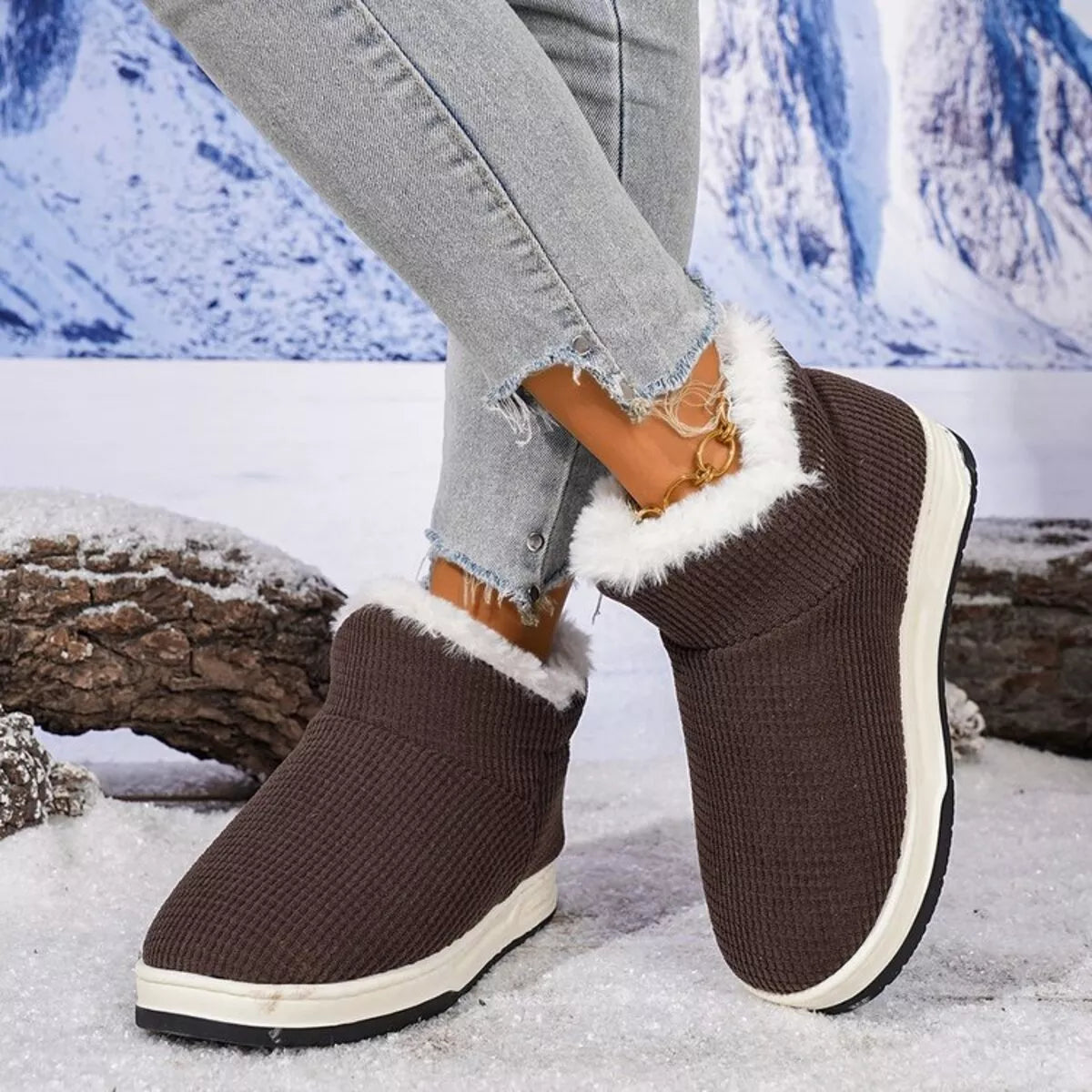 Chocolate brown knit ankle boots with plush white collar and thick sole