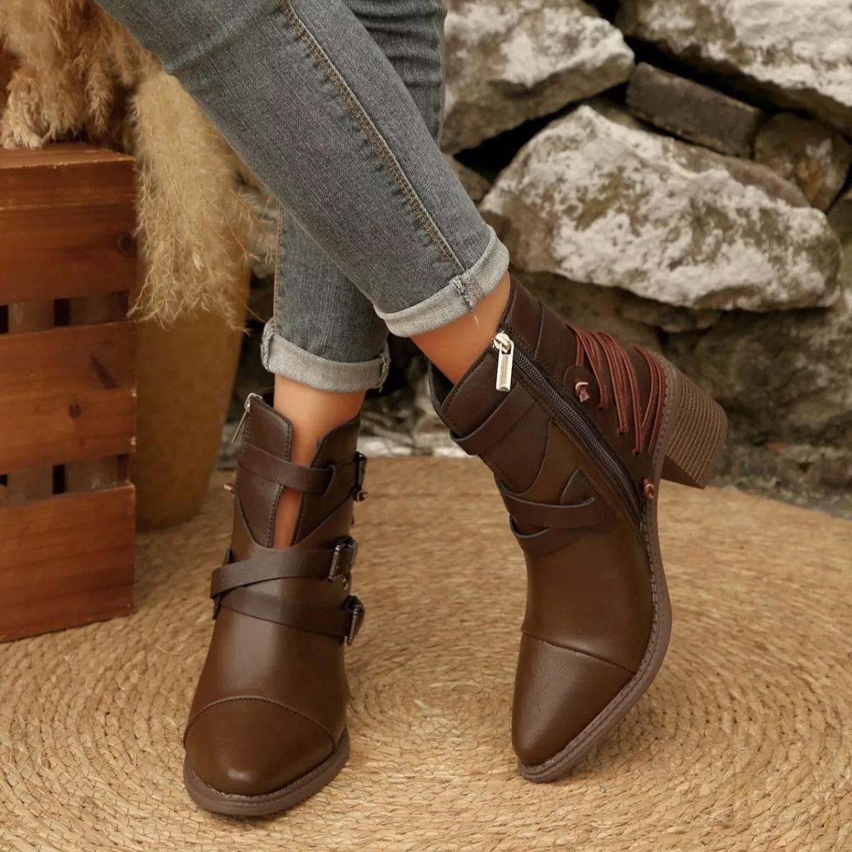 Dark brown point-toe ankle boots with buckle straps and block heels