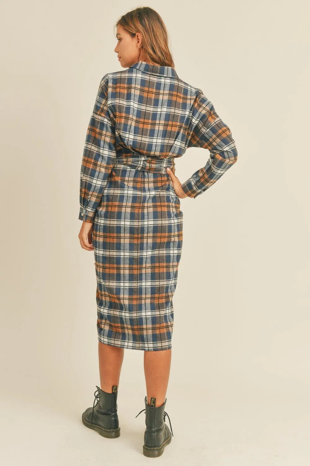 Plaid flannel shirt dress with button front and waist tie belt, back view