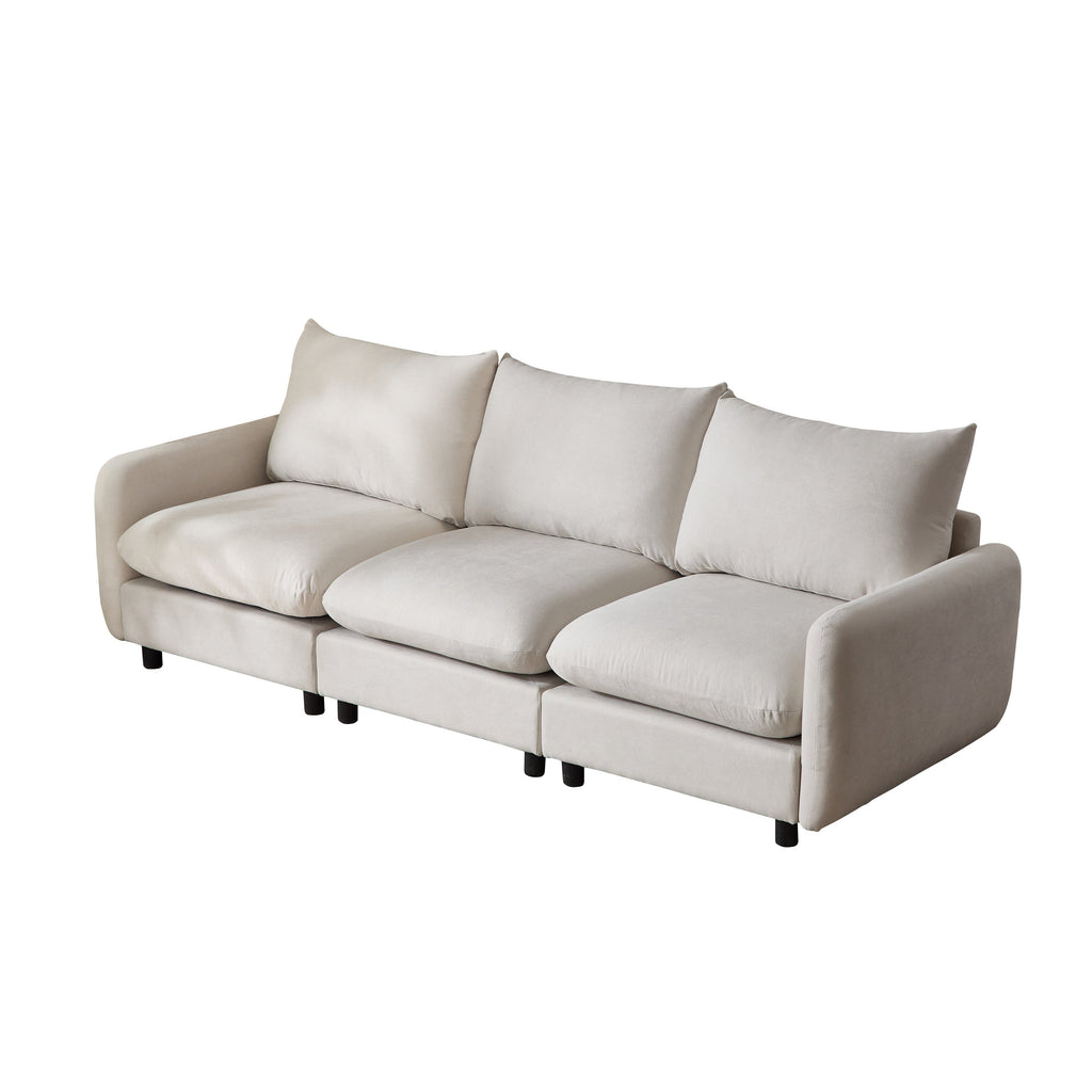 White loveseat sofa with three back pillows and wide cushioned arms