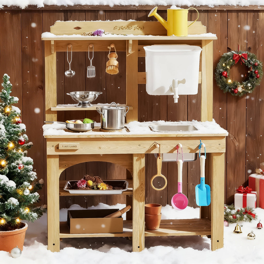 Kids' wooden mud kitchen with countertop, sink, faucet, and hanging utensils