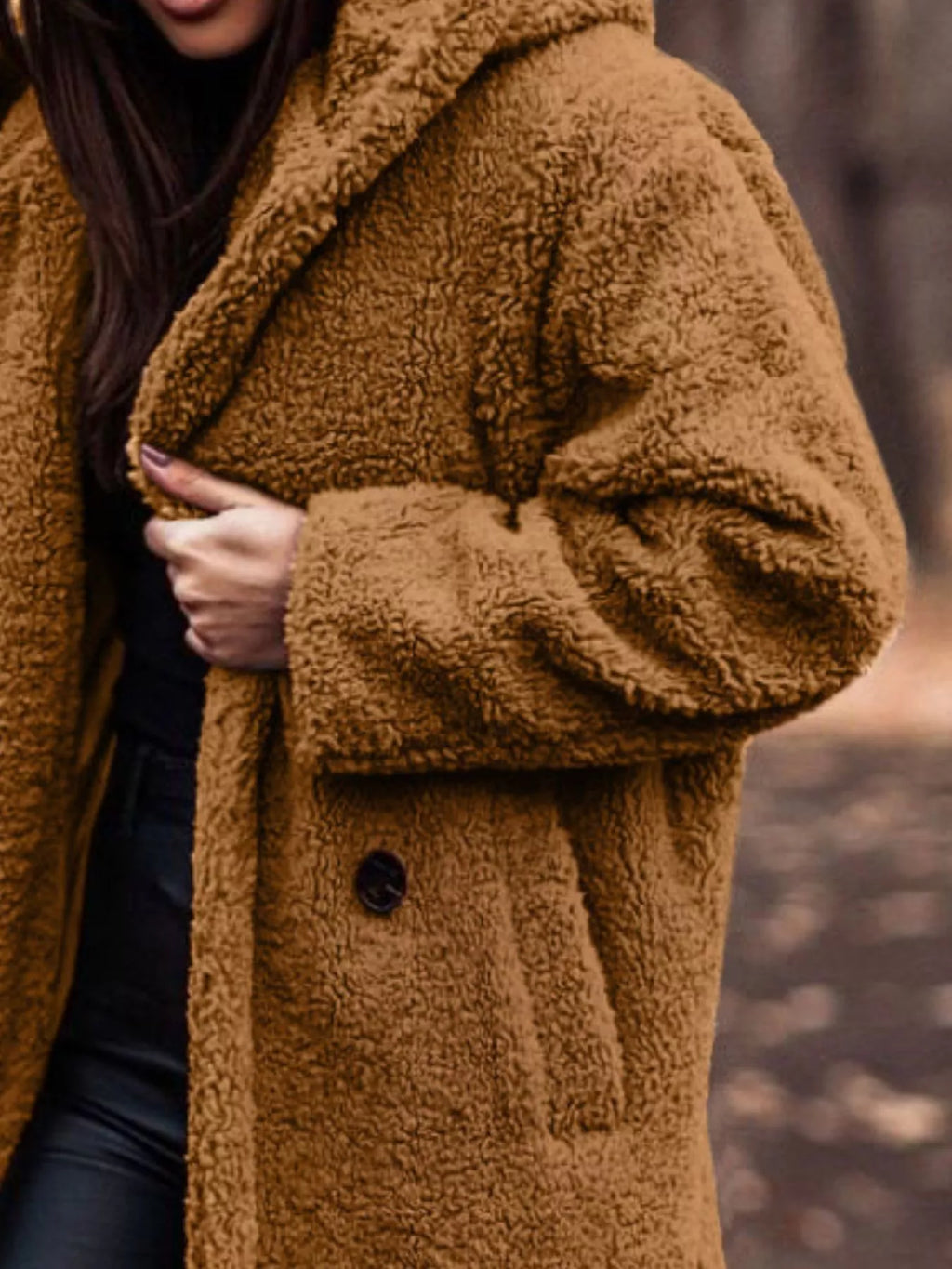 Camel hooded teddy longline coat with button front and oversized fuzzy sleeves.