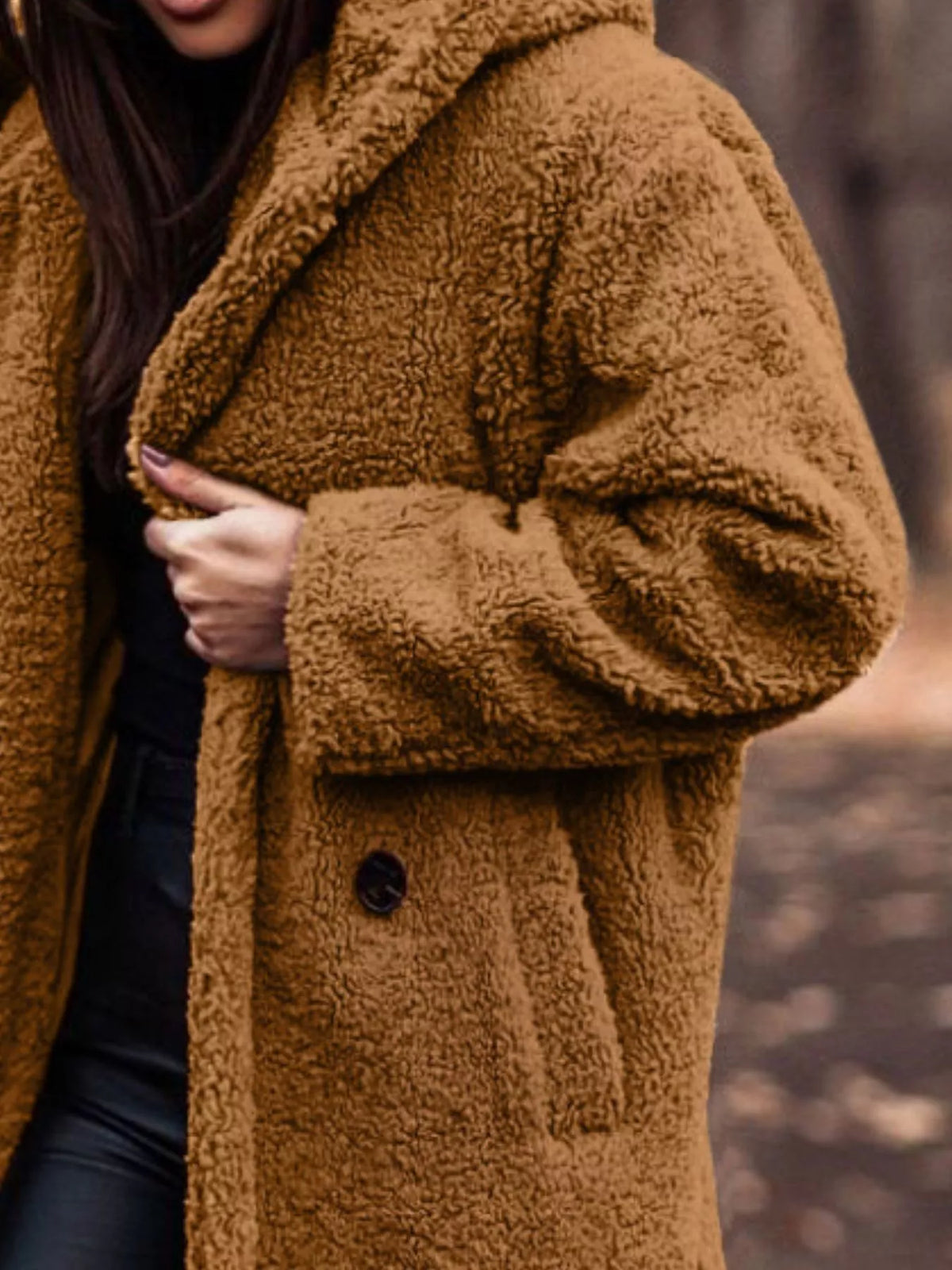 Camel hooded teddy longline coat with button front and oversized fuzzy sleeves.