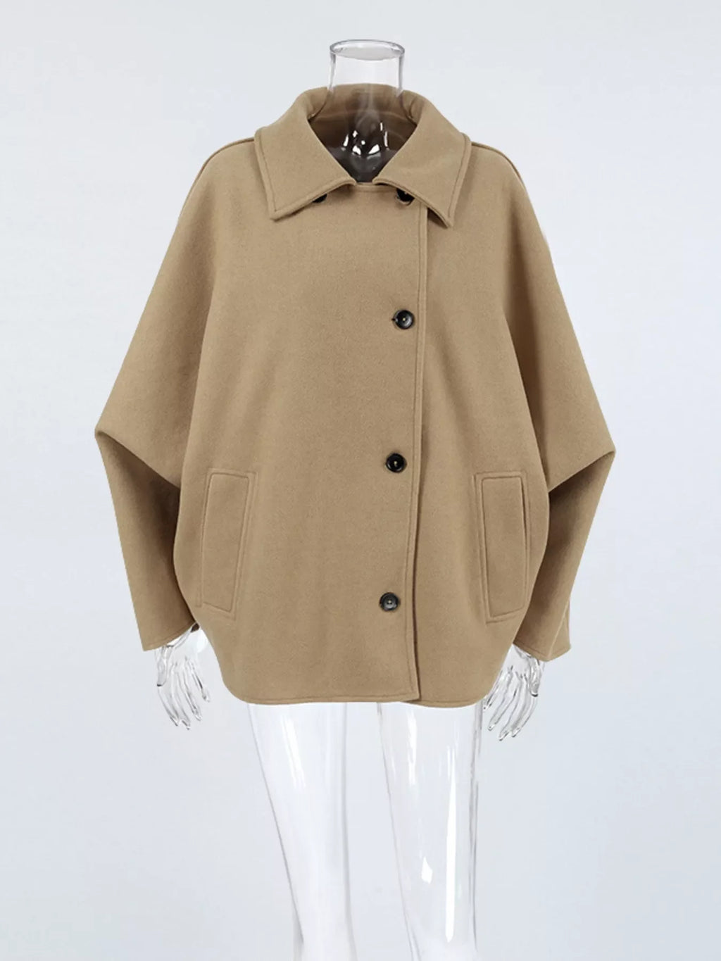 Khaki button-up coat on mannequin with notched collar and button placket