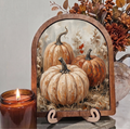 Pumpkin trio framed fall art with wooden arch frame and two stand feet, Halloween scene