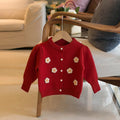 Red kids cardigan sweater with small flower details and gold-tone button placket