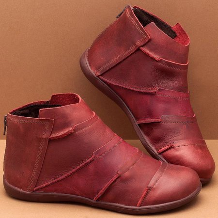 Red short ankle boots with side pull tab and decorative stitching