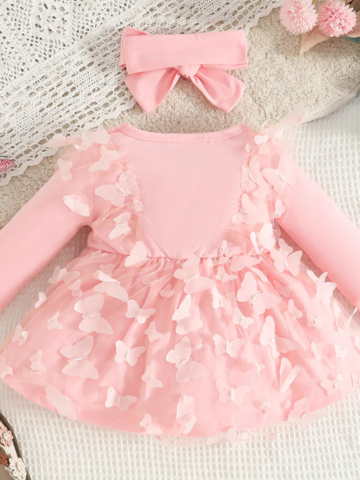 Pink dress with layered butterfly flower appliques and wide bow headband