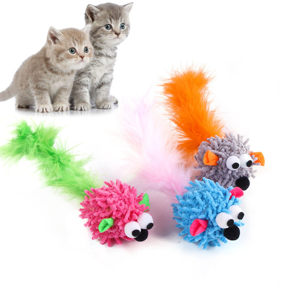 Colorful plush cat toy mice with fuzzy tails in orange, green, pink, and blue