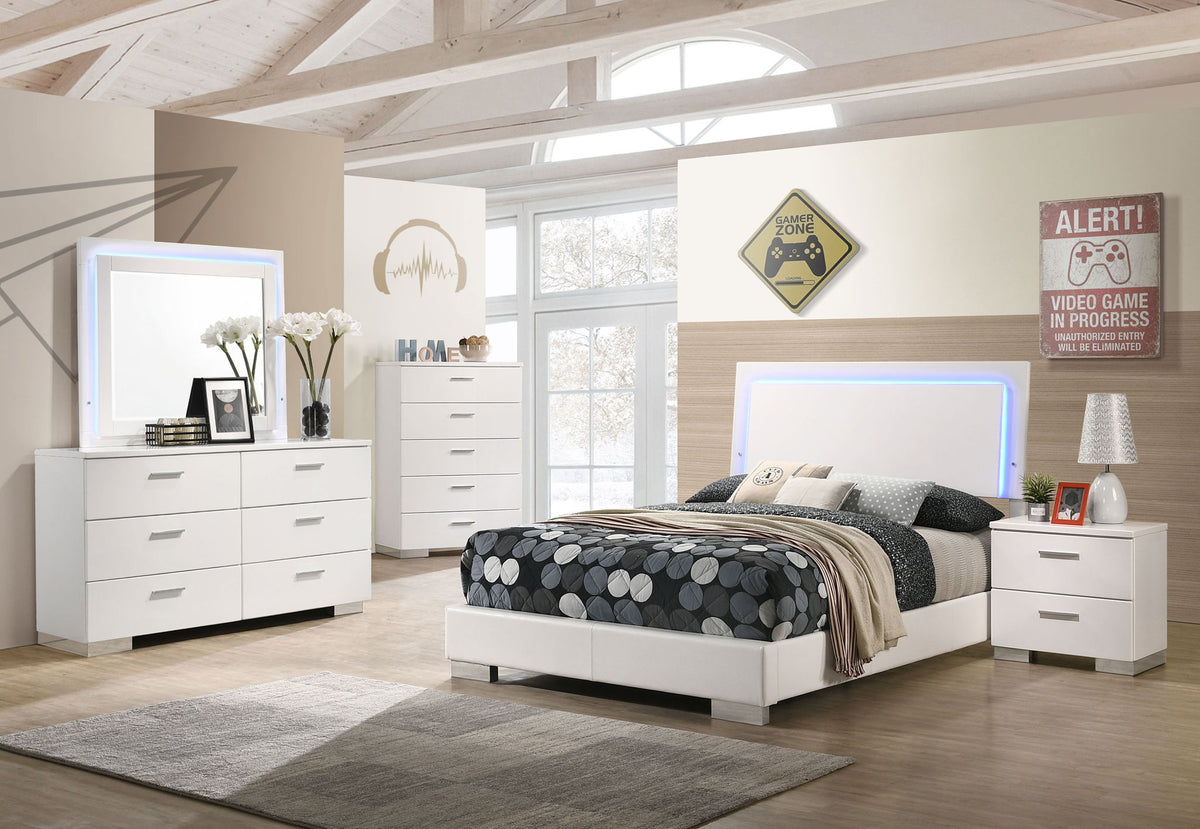 White high-gloss bedroom set with bed, dresser, and matching nightstands