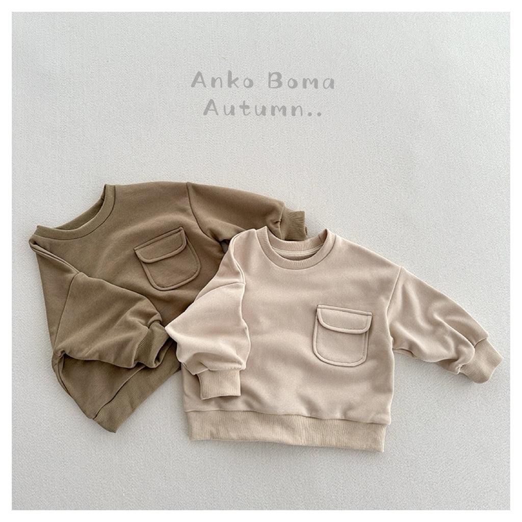 Two solid-color pullover sweatshirts, each with round neck and front pocket