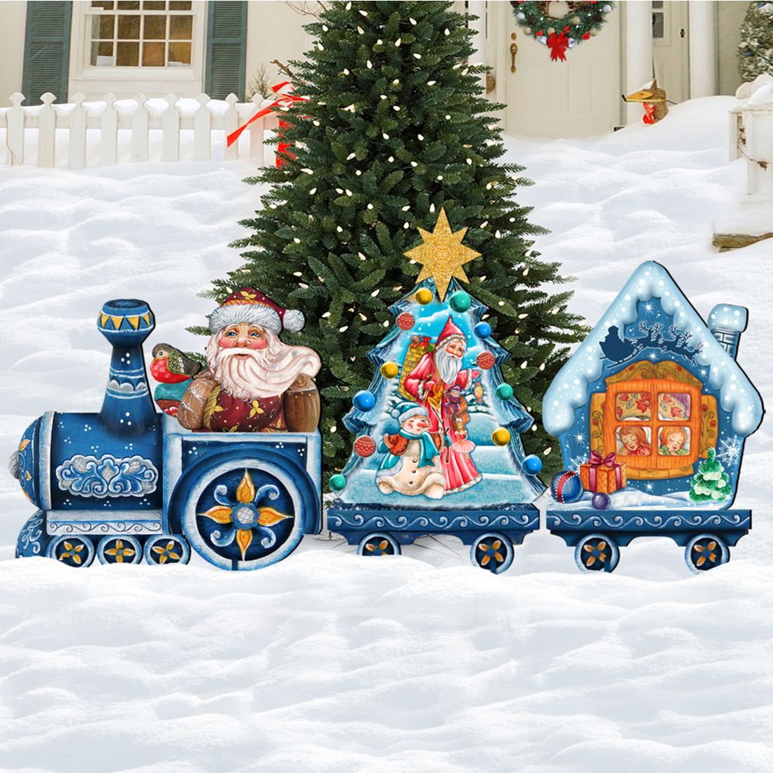 Blue holiday train decor with Santa, a snowman, and a decorated tree centerpiece