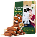 Chicken calcium bones dog chews in green pouch with stacked brown treats and white tips