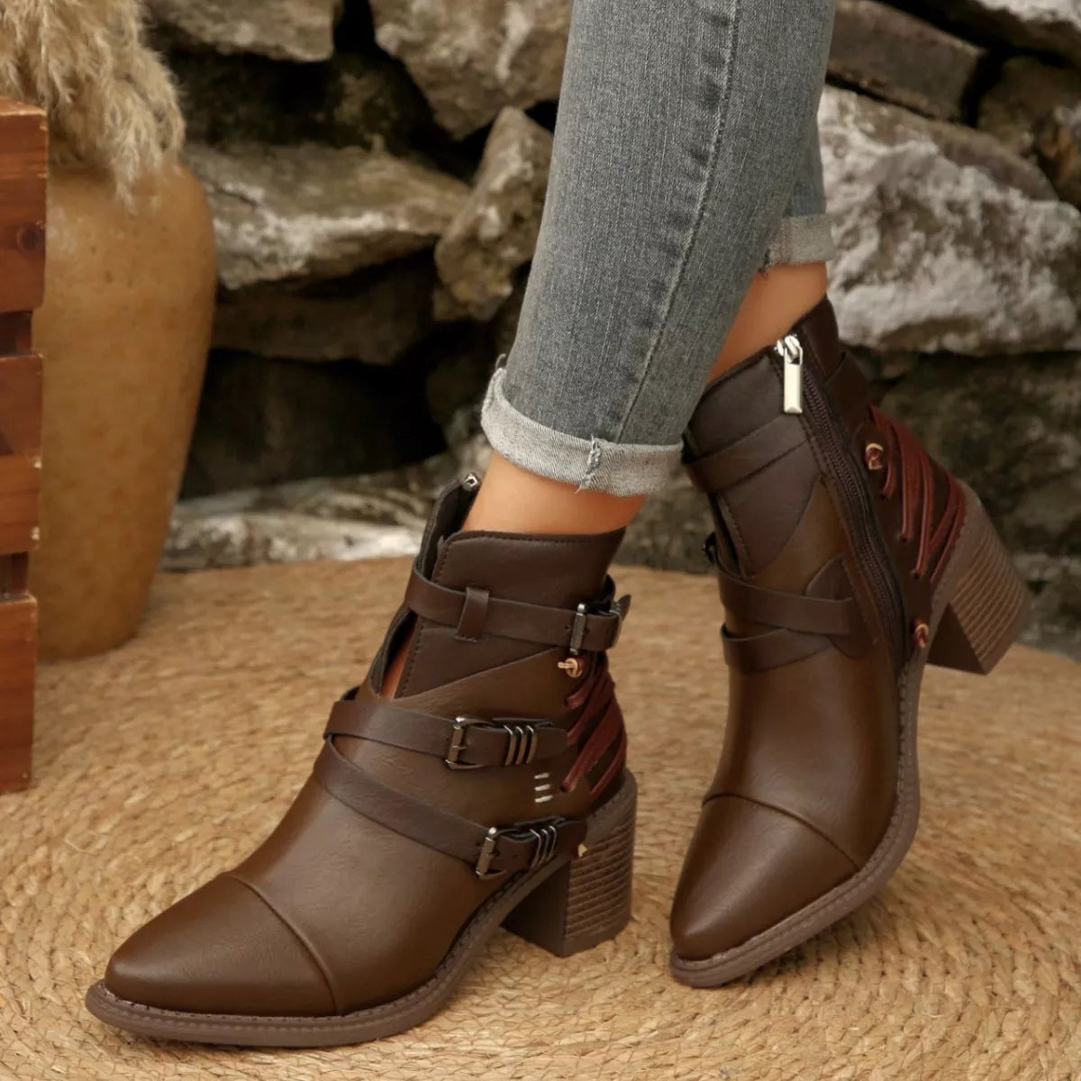 Dark brown point-toe ankle boots with buckle straps and block heels