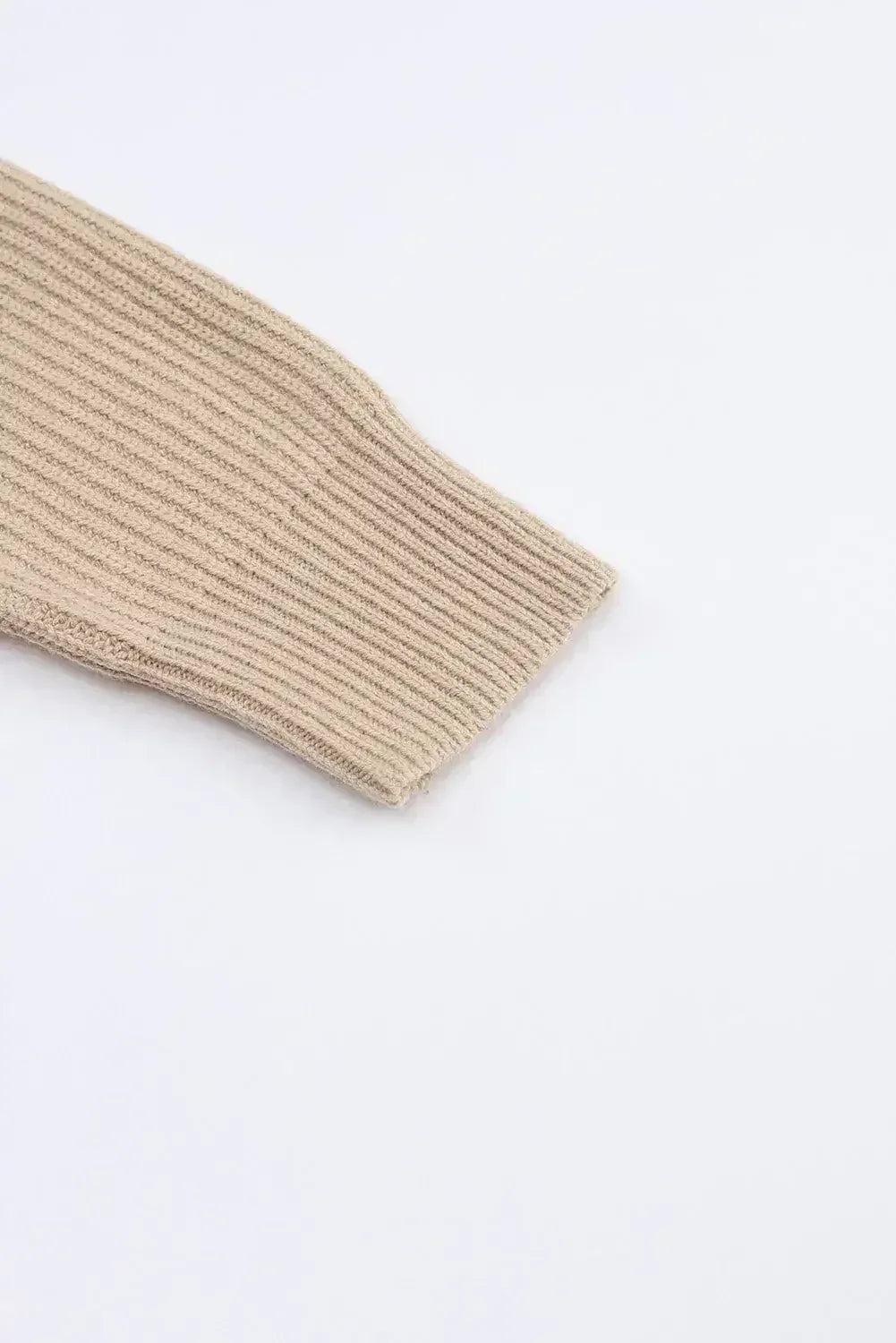 Beige ribbed knit cardigan cuff with thick folded hem edge