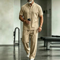 Khaki short-sleeve button shirt and matching pants set, front standing