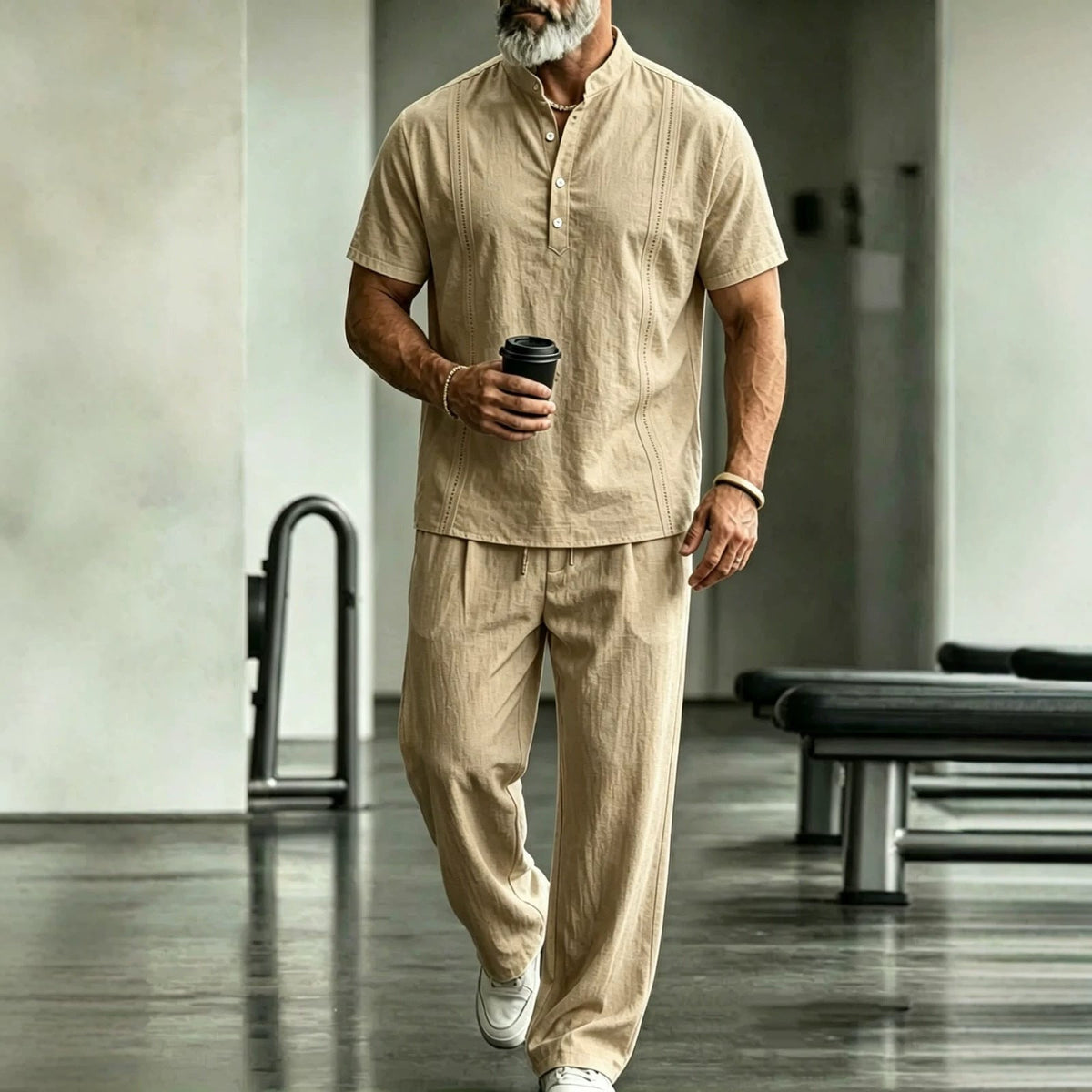 Khaki short-sleeve button shirt and matching pants set, front standing