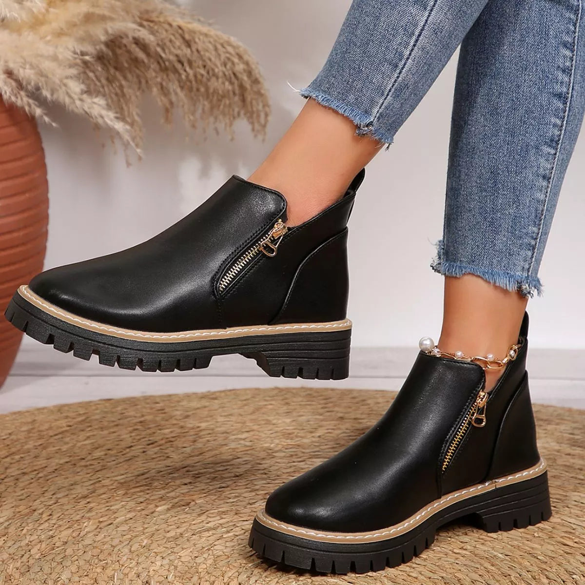 Black ankle boots with side zipper and platform lug sole