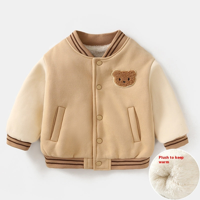 Cream fleece-lined baseball jacket with teddy bear patch, snap front, side pockets, striped trim.
