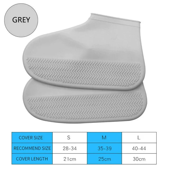 Gray silicone shoe cover boots, stacked pair with zigzag traction tread