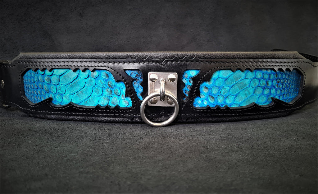 Black leather dog collar with bright blue scale panels, metal ring and keeper