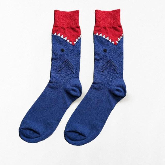 Blue crew socks with red cuff and white shark fin graphic