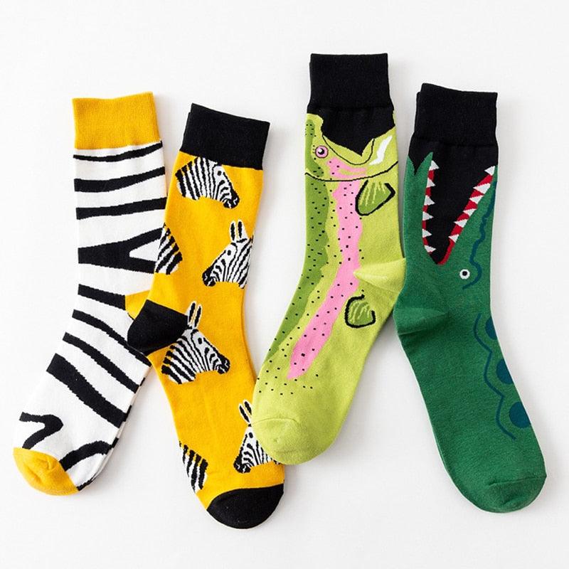 Crew socks in mixed animal prints: zebra stripes, yellow zebra, green crocodile, red fin