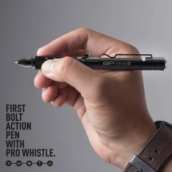 Bolt-action EDC pen with textured grip, shown in hand