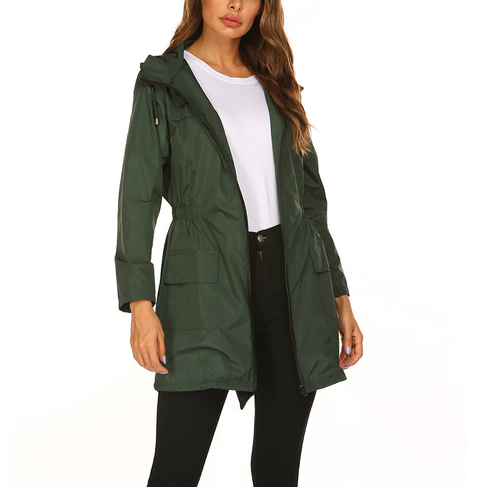 Women’s hooded waterproof raincoat, deep green, zip front, flap pockets, adjustable waist