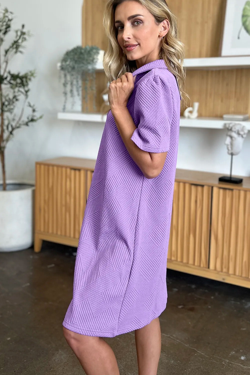 Lavender textured collared short-sleeve shift dress, side profile view