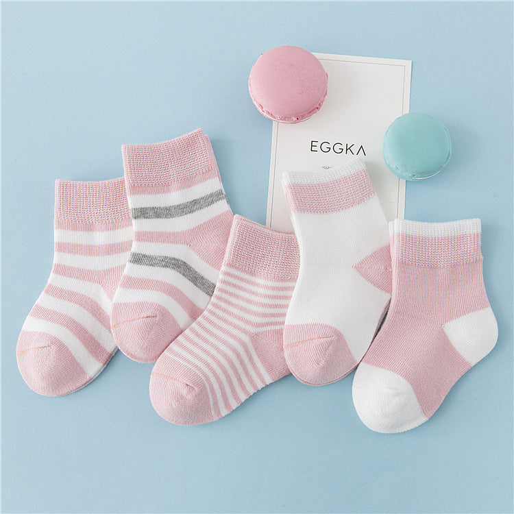 Children's winter cotton striped socks in pink and white with ribbed cuffs