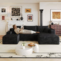 Dark fabric L-shaped sectional sofa with chaise and three seat cushions.