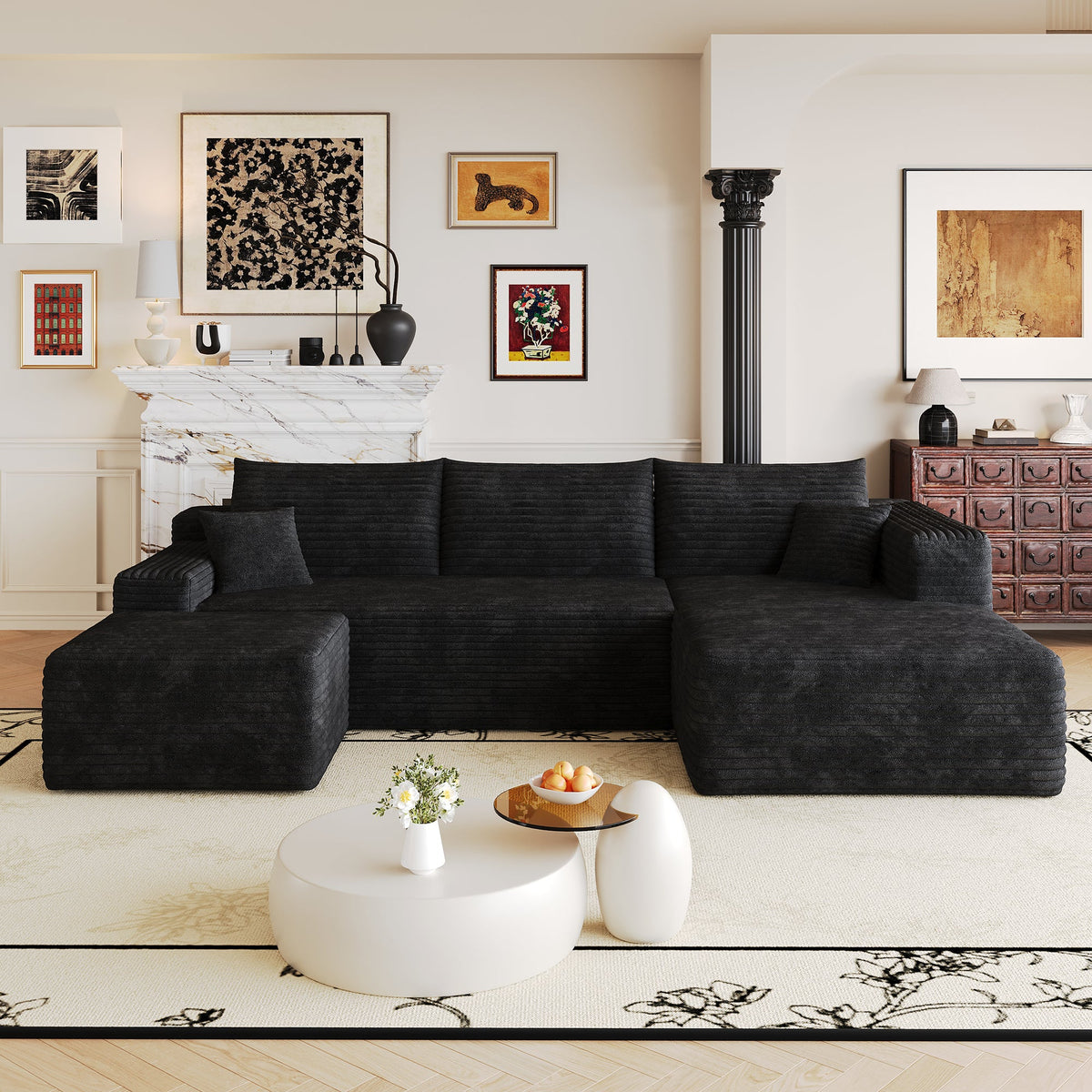 Dark fabric sectional sofa with chaise corner and three back pillows.