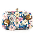 Blue floral sequin clutch bag with gold-tone top clasp and chain strap