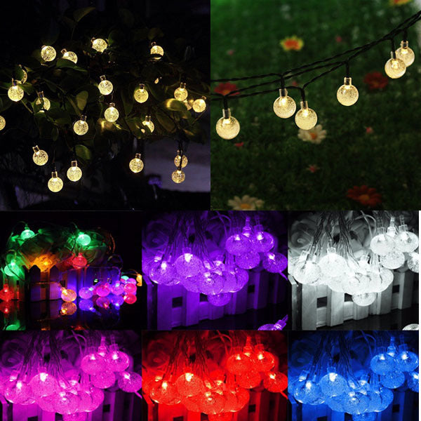 Outdoor solar fairy light string with round globe bulbs in multicolor glow