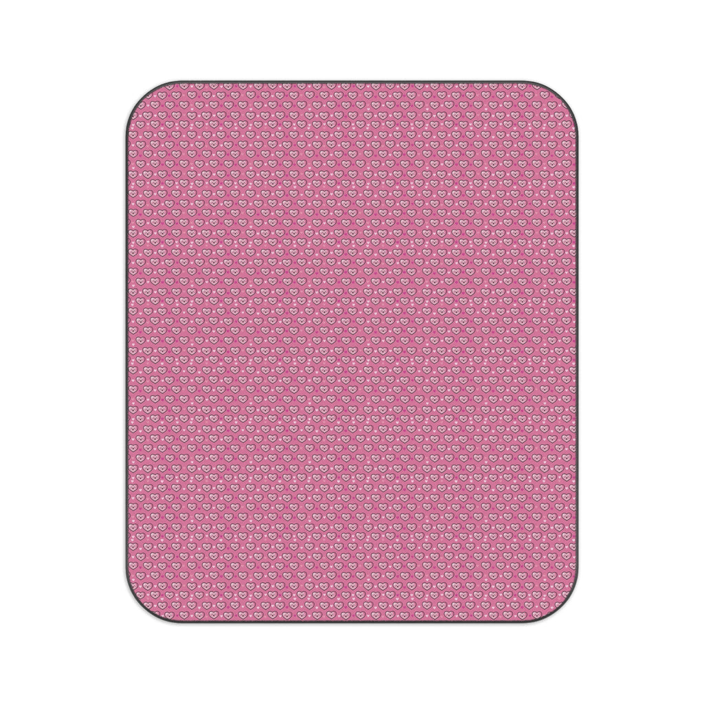 Picnic blanket with pink and purple tiny heart pattern, rounded edges